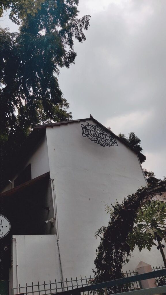 The side angle of a cafe capturing the view of the roof